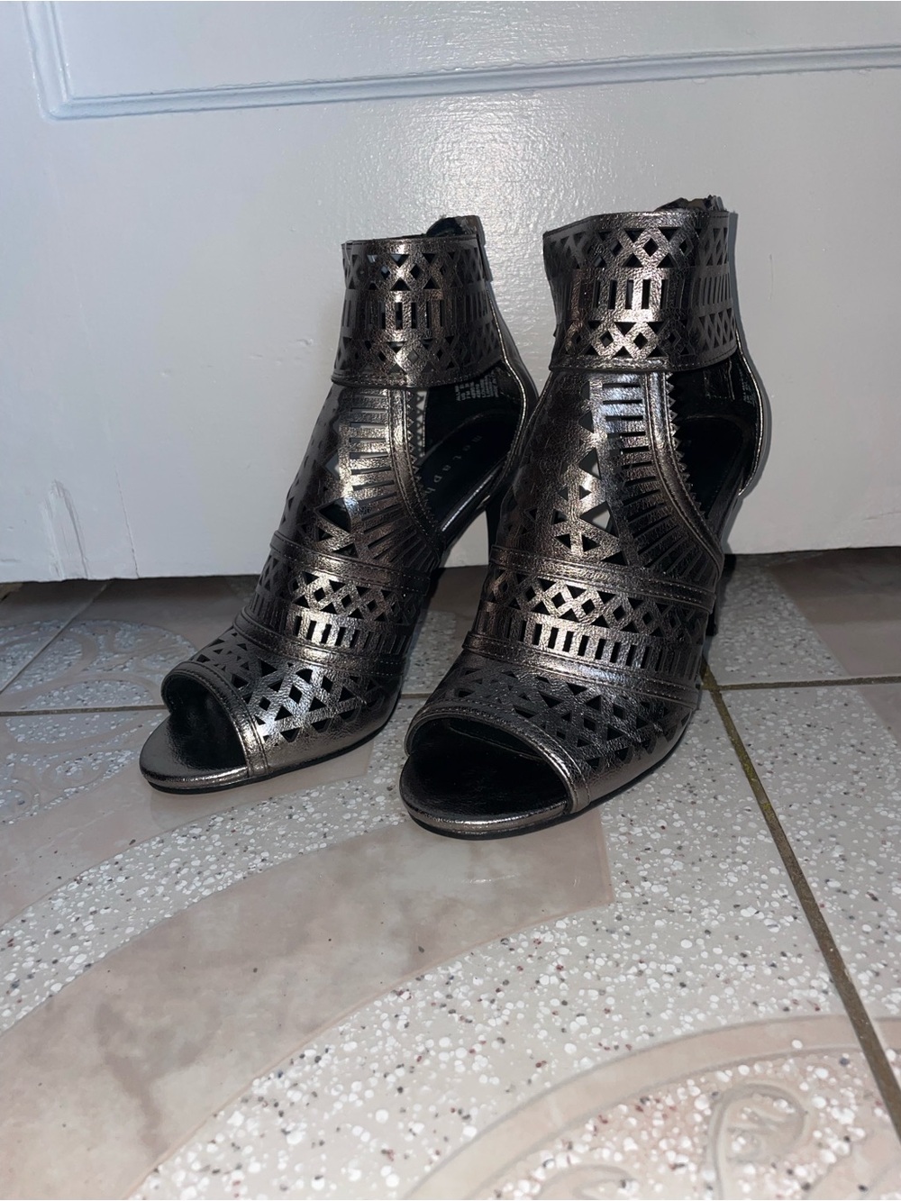 Metaphor Metallic Black Cutout Peep-Toe Ankle Booties